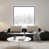 Front view of a modern 4mm thick black full-grain leather modular sofa